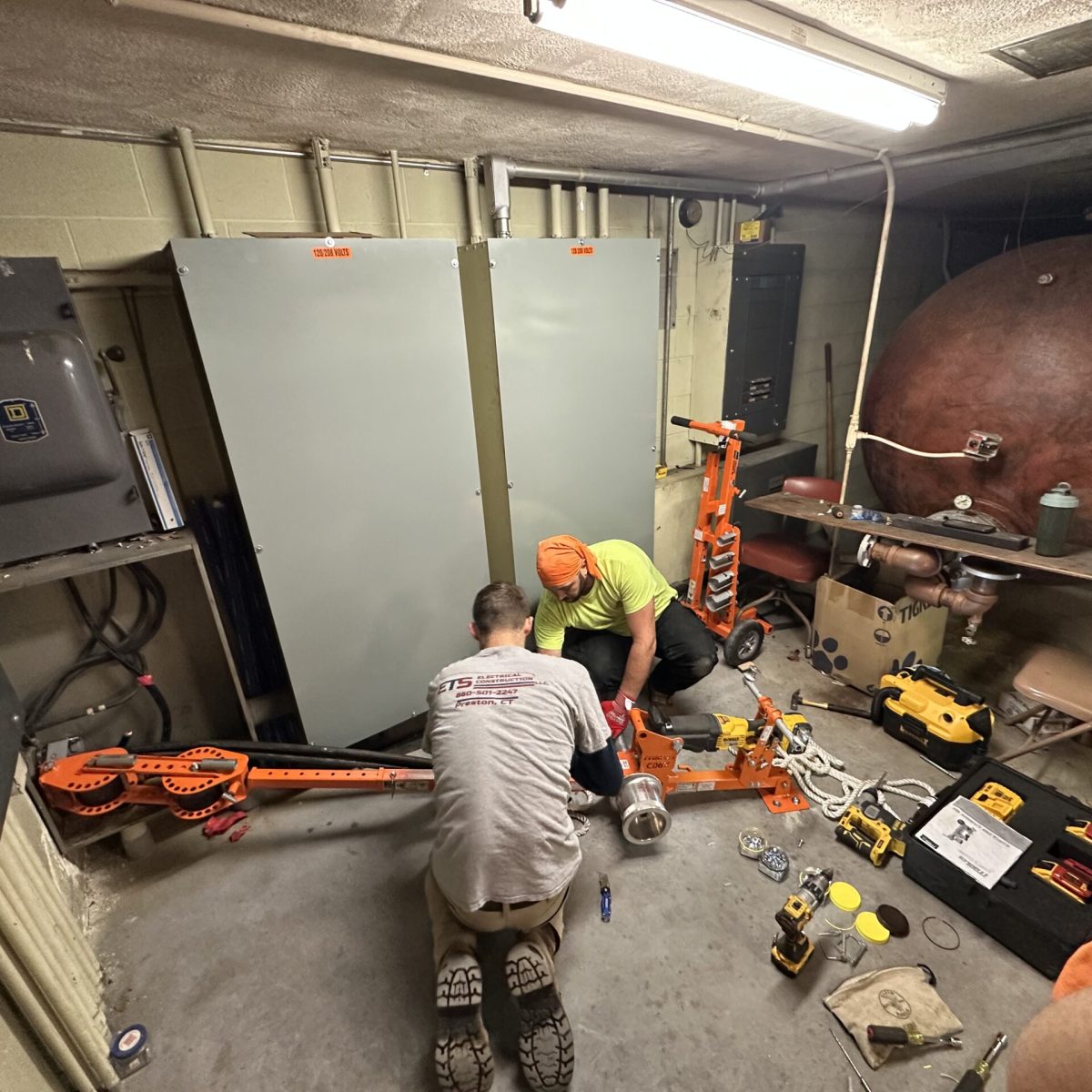Commercial electrician team wiring a retail store Connecticut