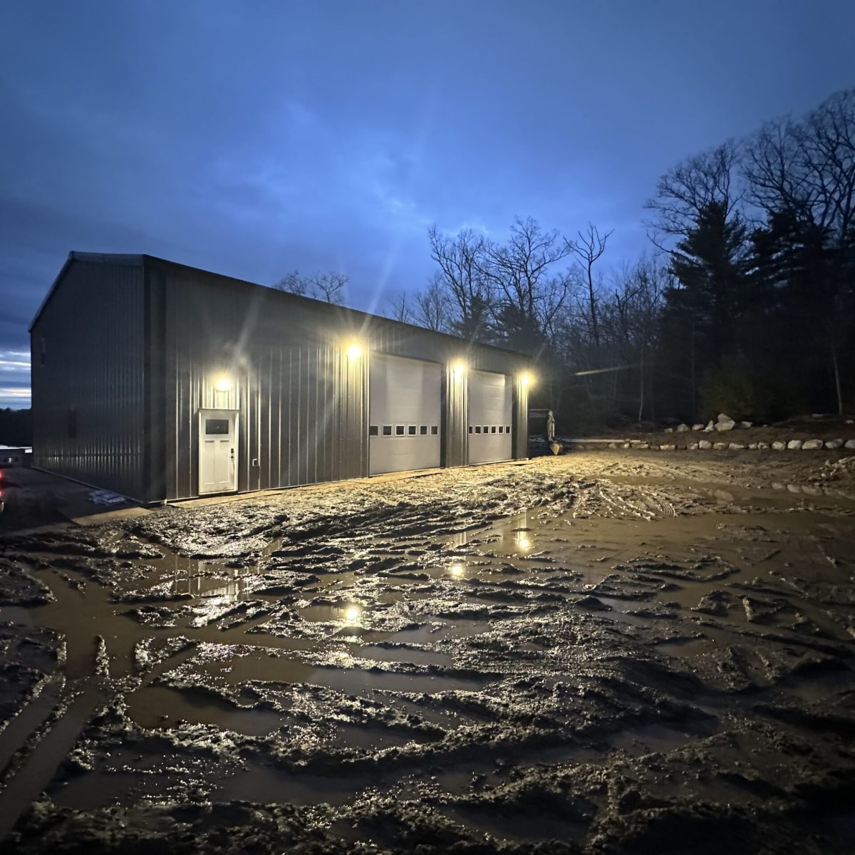 Electricians working on rooftop conduit Connecticut commercial building