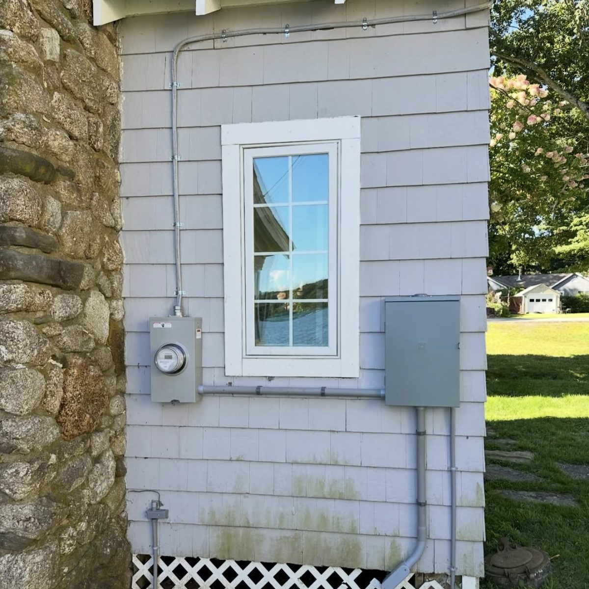 Exterior electrical panel installation on Connecticut residence. Licensed electrician performing safe, code-compliant service upgrade