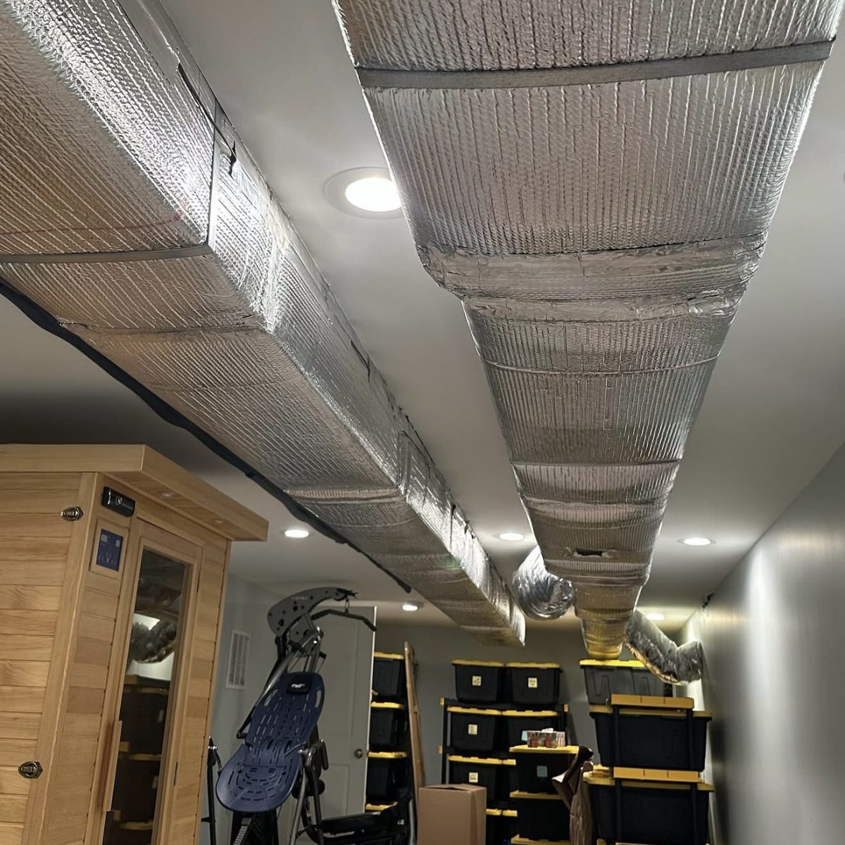 Basement ceiling lighting installation in Connecticut by licensed electrician. Modern, energy-efficient recessed fixtures.