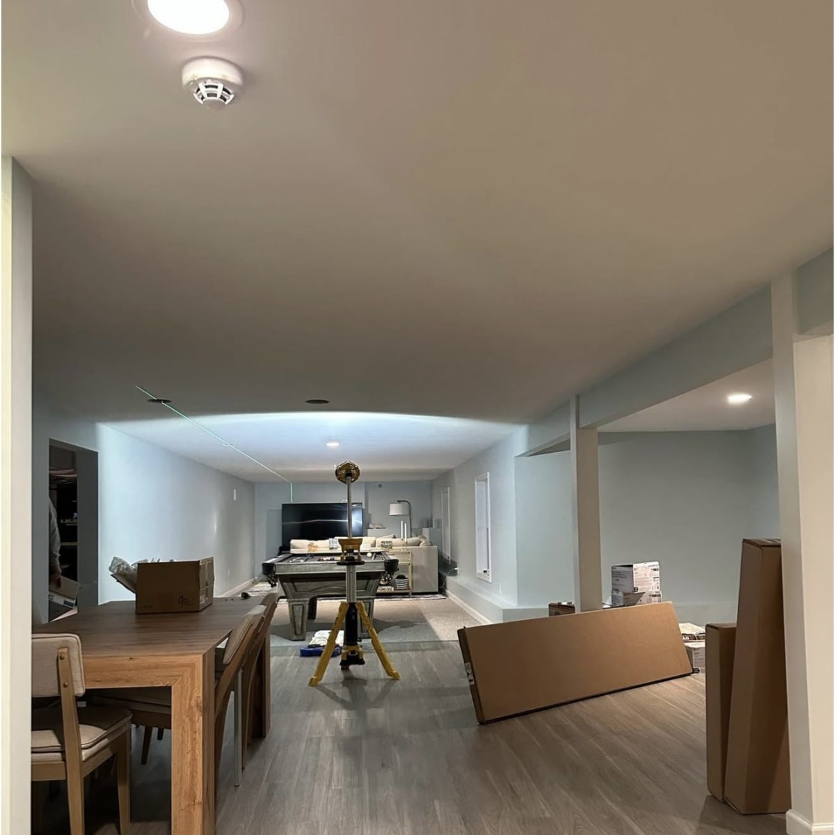Basement ceiling lighting installation in Connecticut by licensed electrician. Modern, energy-efficient recessed fixtures.